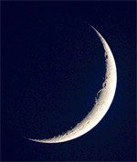 crescent moon shining on the dark night sky. This is a symbol of the bindu chakra